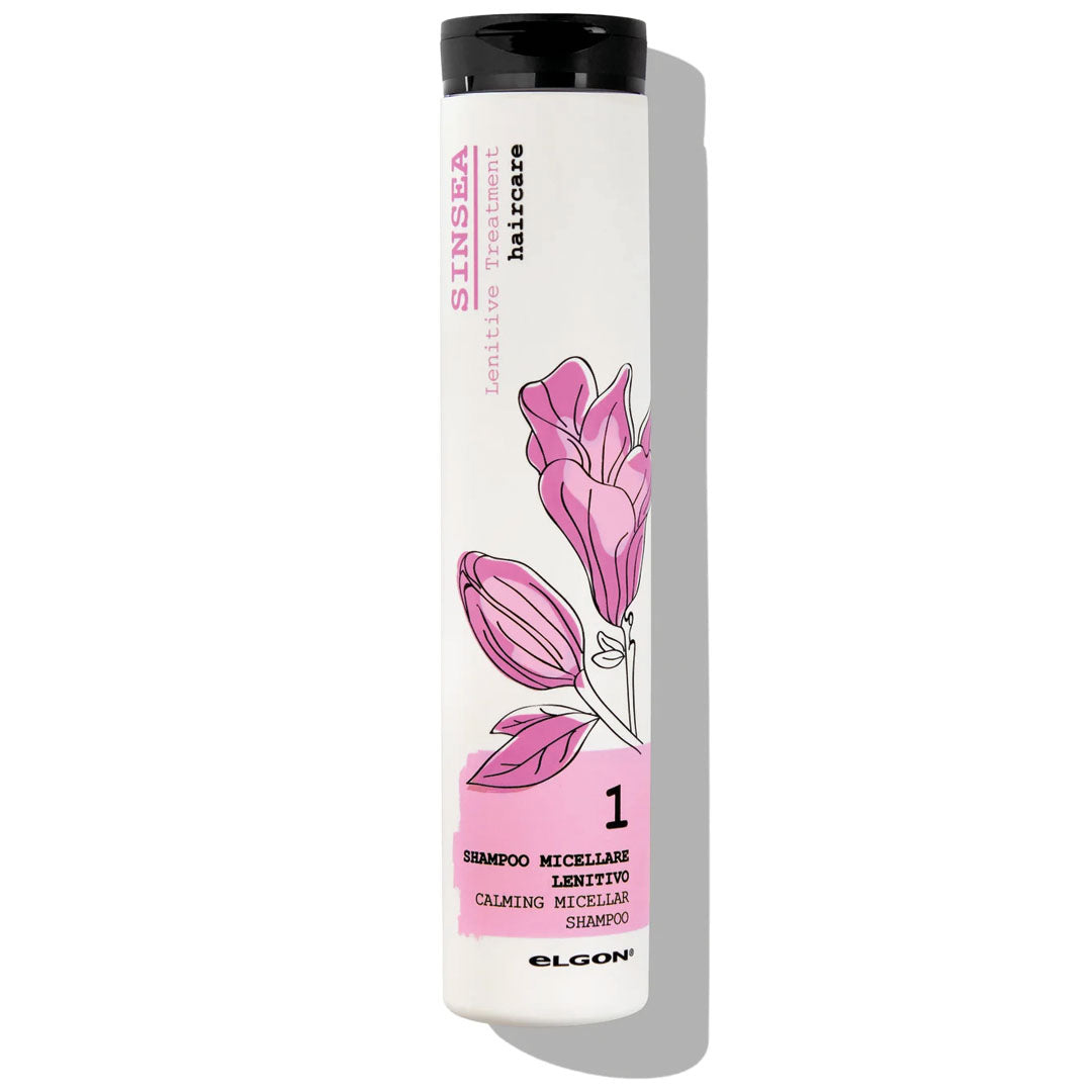 Shampoo delicato per cuti sensibili. Flacone alto e magro di colore bianco e rosa a tema floreale, tappo fliptop nero tutto corpo.