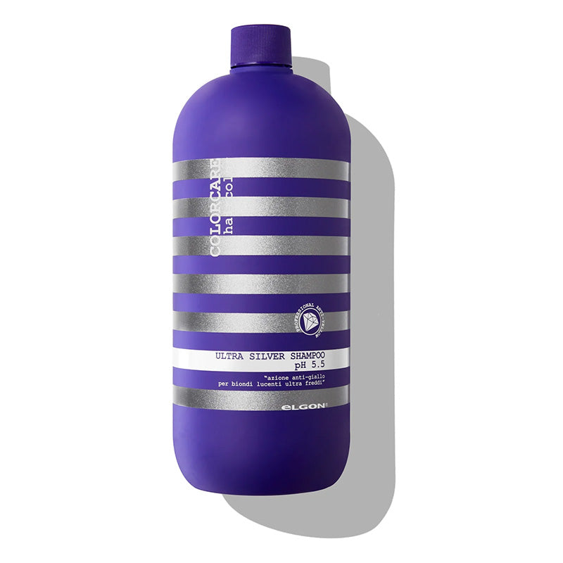 Shampoo antigiallo ultrapigmentante per ottenere biondo effetto ghiaccio. Flacone da litro di colore argento e viola.